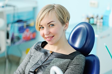 woman smiling in dental chair