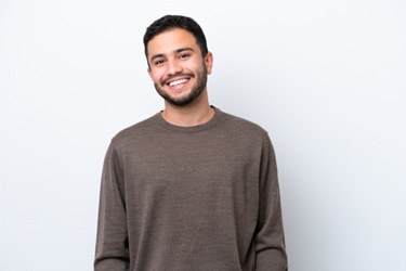 Smiling man enjoying the benefits of his dental bridge