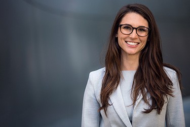 Confident, professional woman enjoying the benefits of cosmetic dentistry