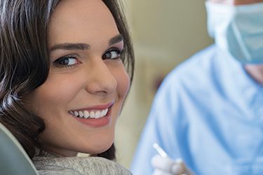 Smiling woman in dental chair