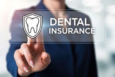 Woman standing behind translucent dental insurance graphic