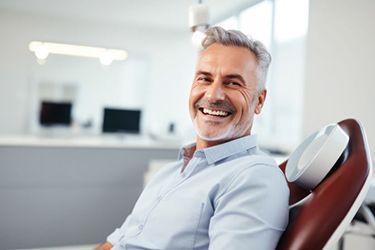 Mature man attending dental checkup