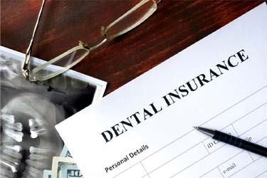 Papers for dental insurance coverage of dental implants in Schenectady