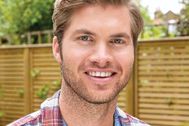 Young man with whole healthy smile