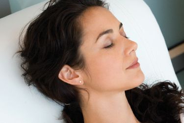 Relaxed woman with eyes closed