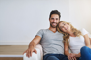 Smiling couple with gorgeous teeth