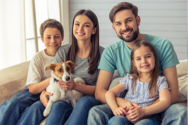 Happy family and dog