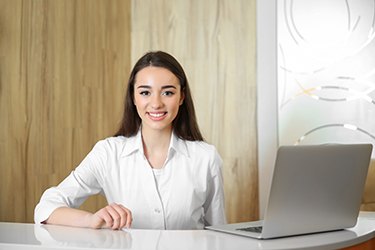 Dental team member, ready to accept payment