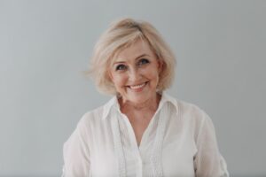 Portrait of smiling senior woman with nice teeth