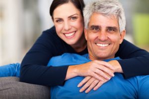 attractive middle-aged couple smiling