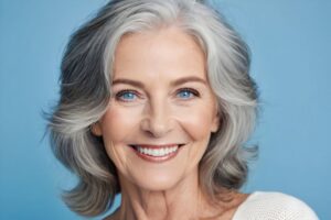 Smiling senior woman with beautiful teeth 