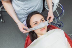 Dental patient wearing nasal mask for nitrous oxide
