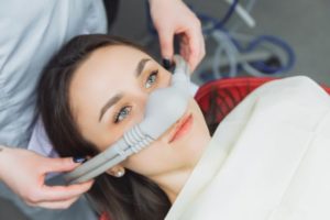 Dental patient wearing nose mask for nitrous oxide