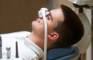 Man relaxing while under the influence of nitrous oxide