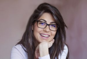 Portrait of happy woman with braces as an adult